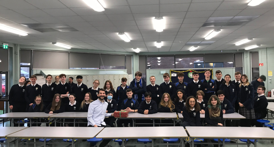 Students from Terenure Presentation College sit with a member of staff from Dublin Simon. They are handing over vouchers for the rough sleepers of Dublin City.